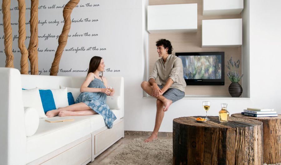 Althea Kalamies Villas Protaras guest lounging at the living room