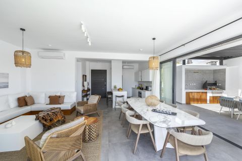 Chris Le Mare Gold Villa Protaras dining table and living room