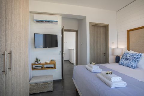 Chris Le Mare Villas Protaras bedroom with closet and TV
