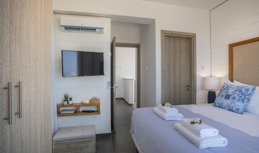 Chris Le Mare Villas Protaras bedroom with closet and TV