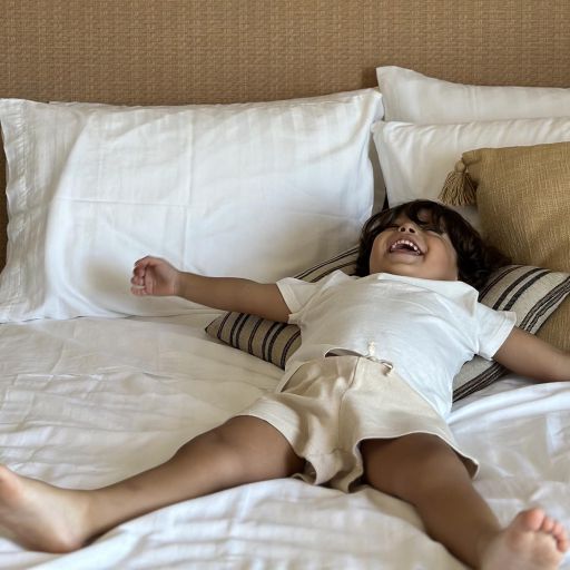 Protaras Lora Pearl Villa Child relaxing on the bed