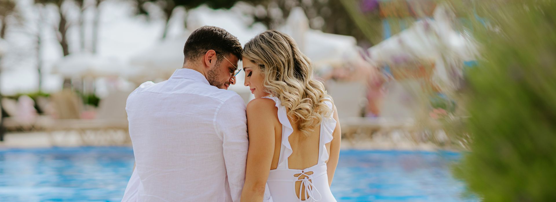 Imperial Island Wedding couple by the pool