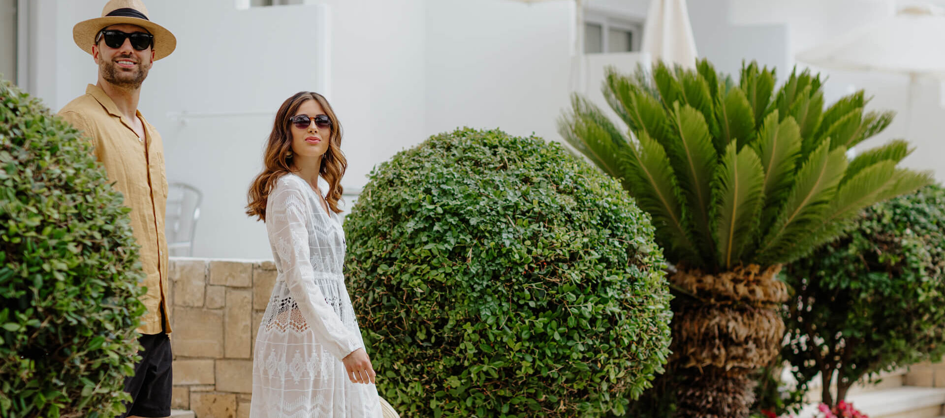 Couple walking through Louis Ledra Garden