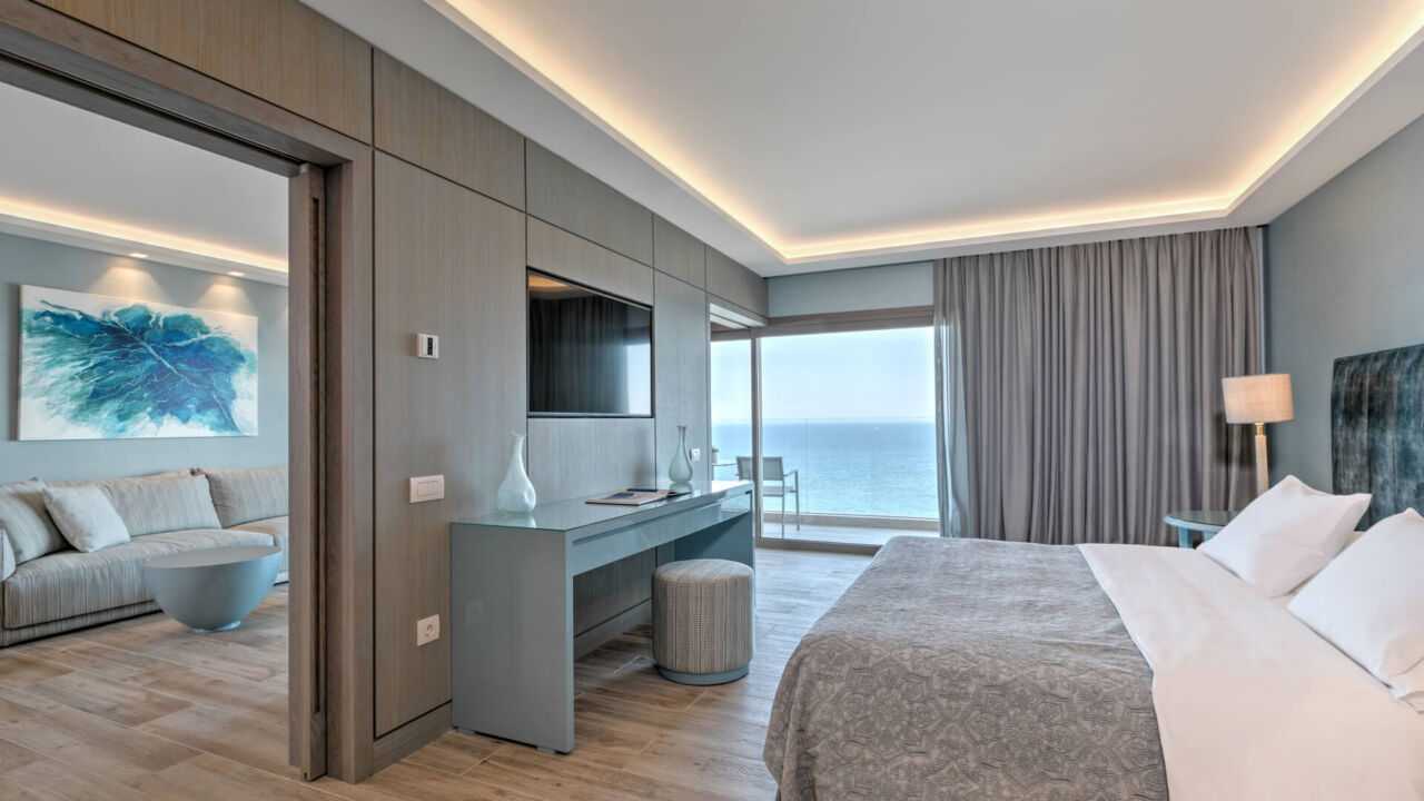 Amada Colossos room bedroom and sitting area