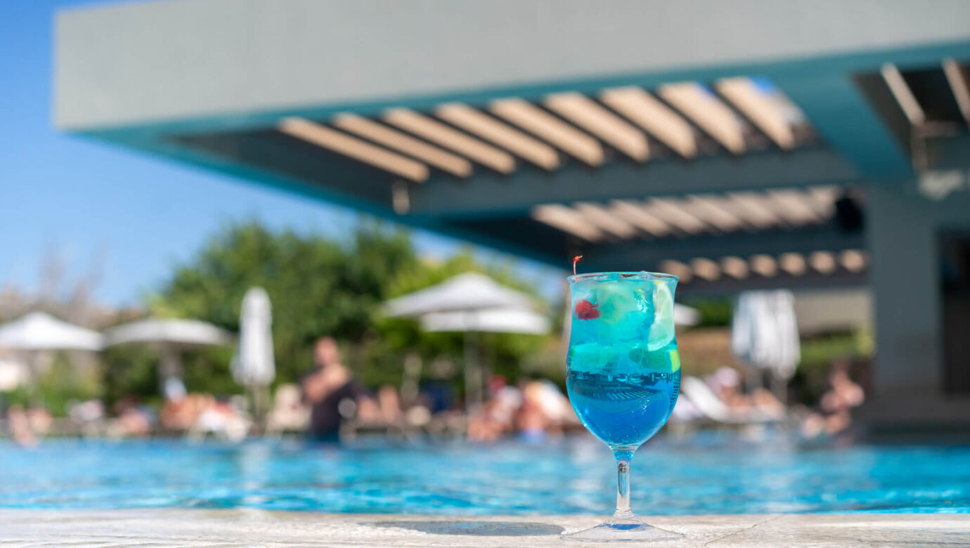 Cocktail next to the pool at Amada Colossos Resort
