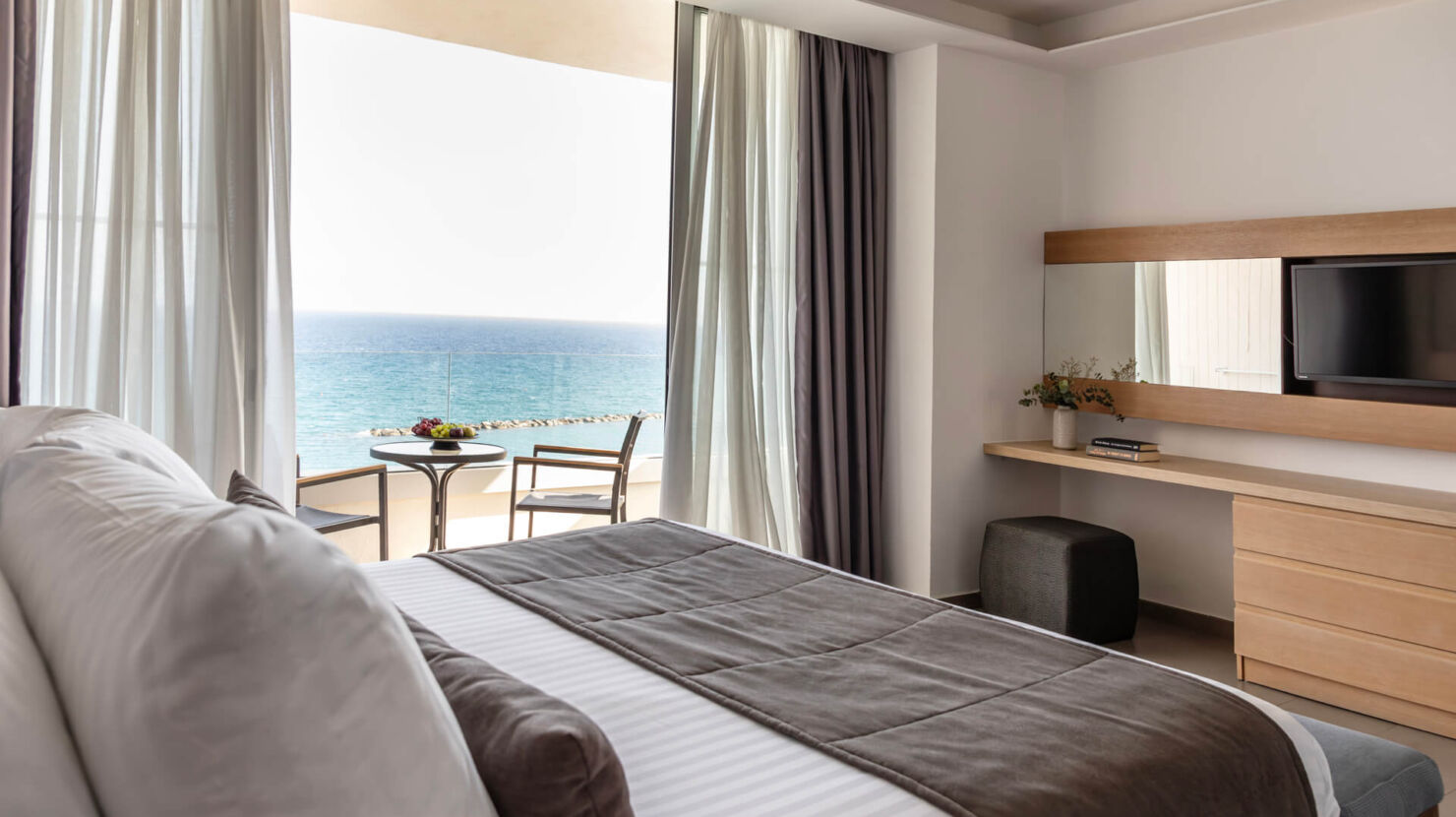 Royal Apollonia Executive suite bedroom and sea view