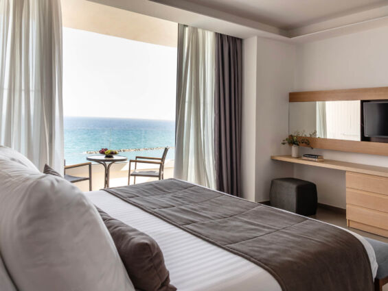 Royal Apollonia Executive suite bedroom and sea view