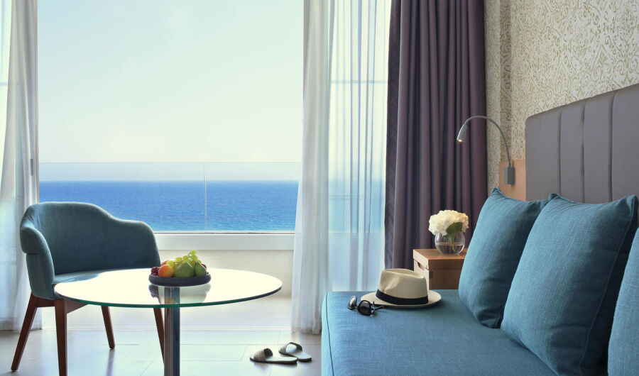 Royal Apollonia Executive suite sitting area and sea view