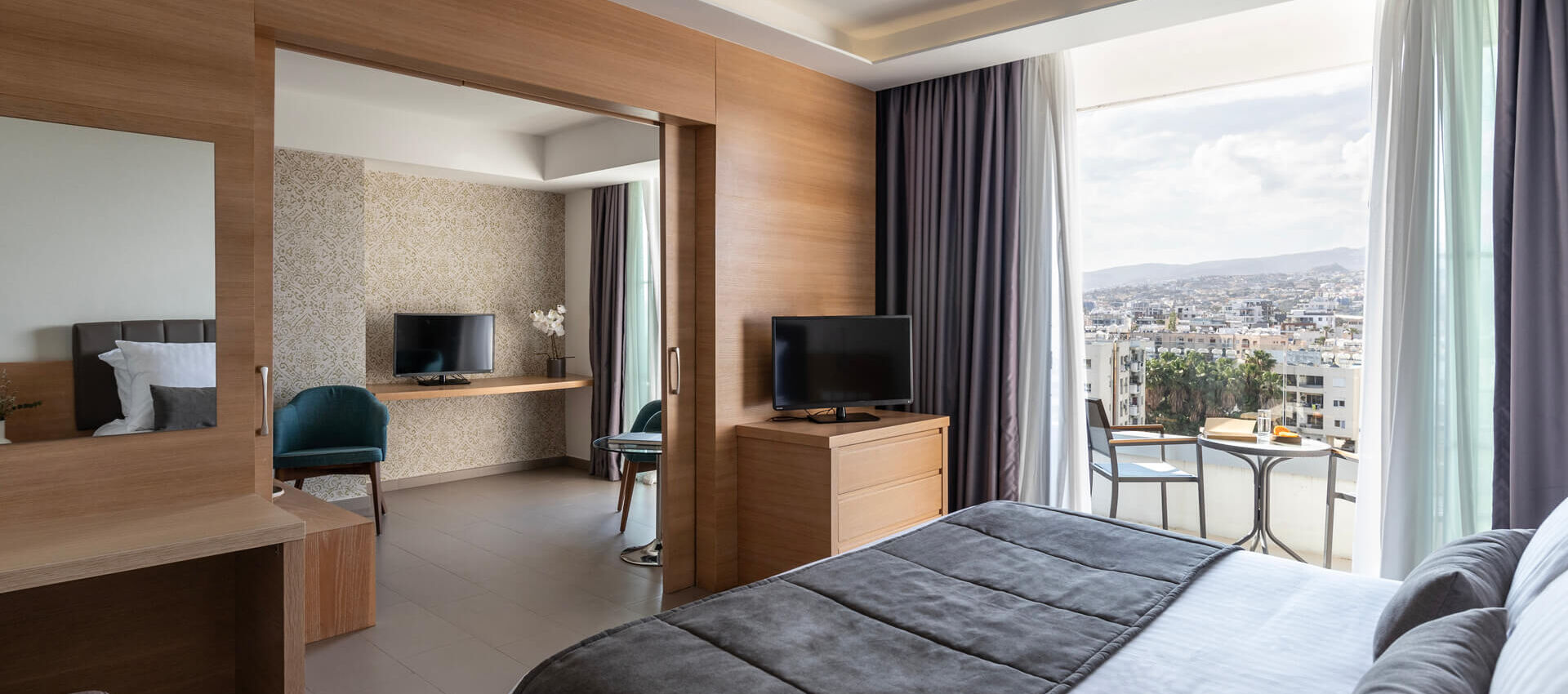 Royal Apollonia Junior suite bedroom and balcony