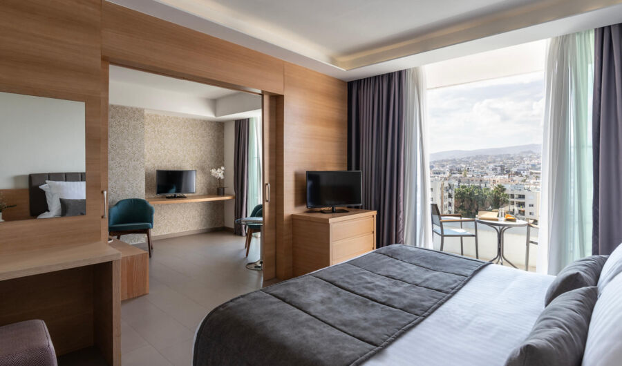 Royal Apollonia Junior suite bedroom and balcony