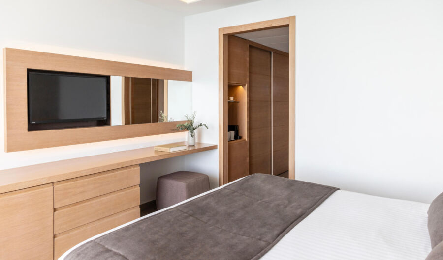 Royal Apollonia Superior Room bedroom and entrance