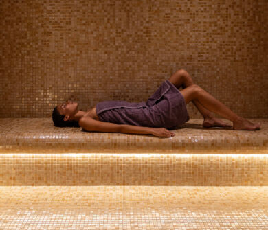 Woman relaxing in the spa of Cali Resort in Paphos