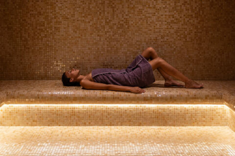 Woman relaxing in the spa of Cali Resort in Paphos