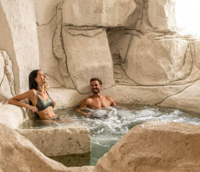 Man and woman in indoor bathtub