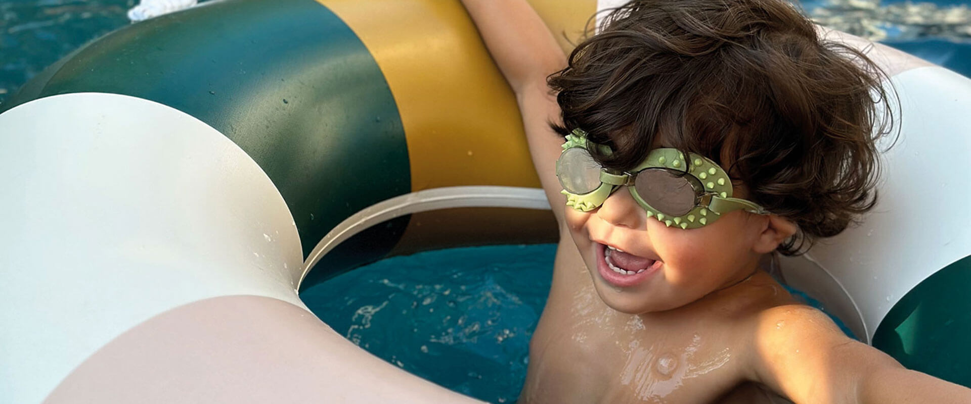 Child in family hotel pool