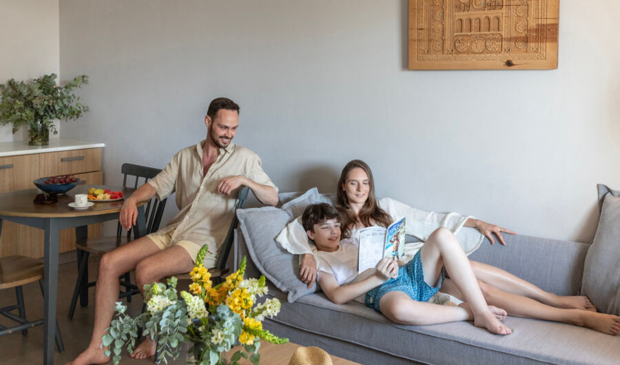 Family relaxing at St.Elias Two Bedroom Suite