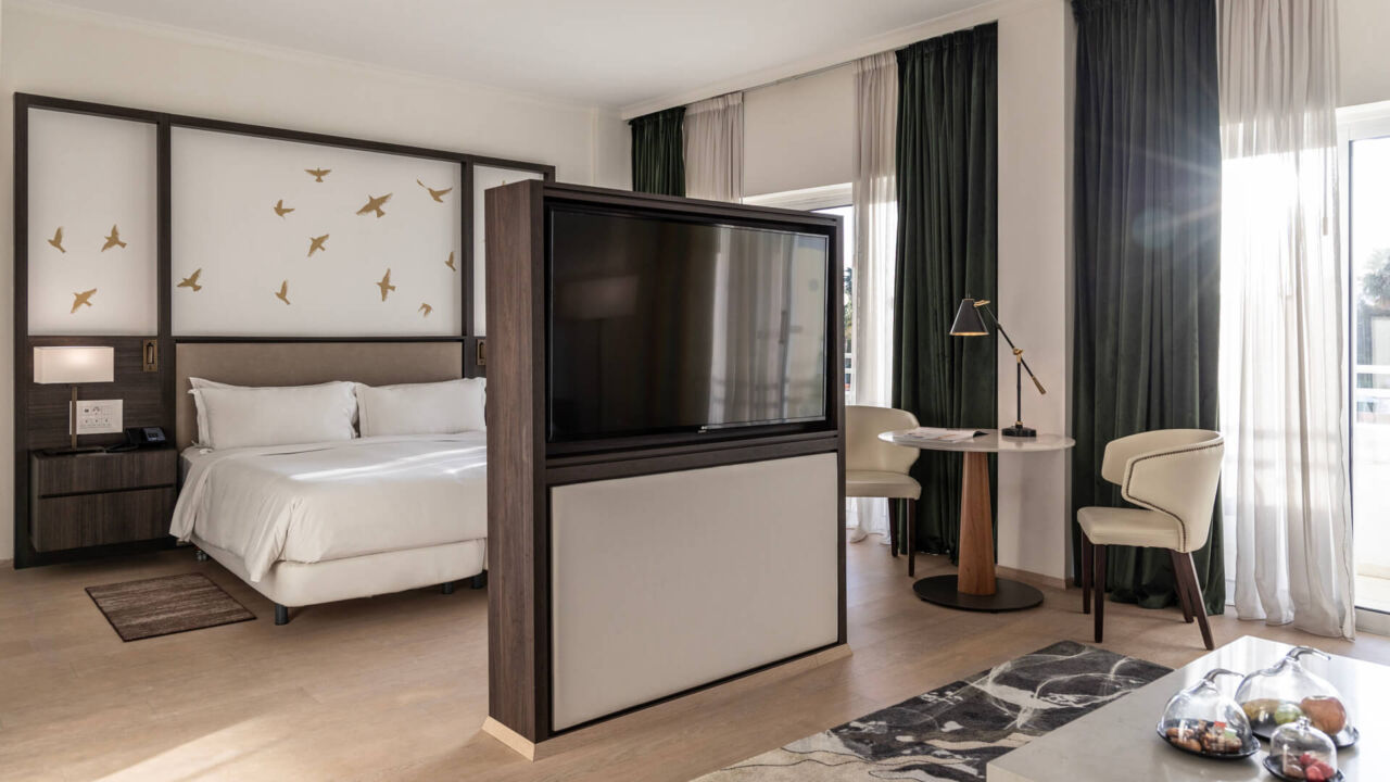 Hilton Nicosia room bedroom and sitting area