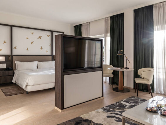 Hilton Nicosia room bedroom and sitting area