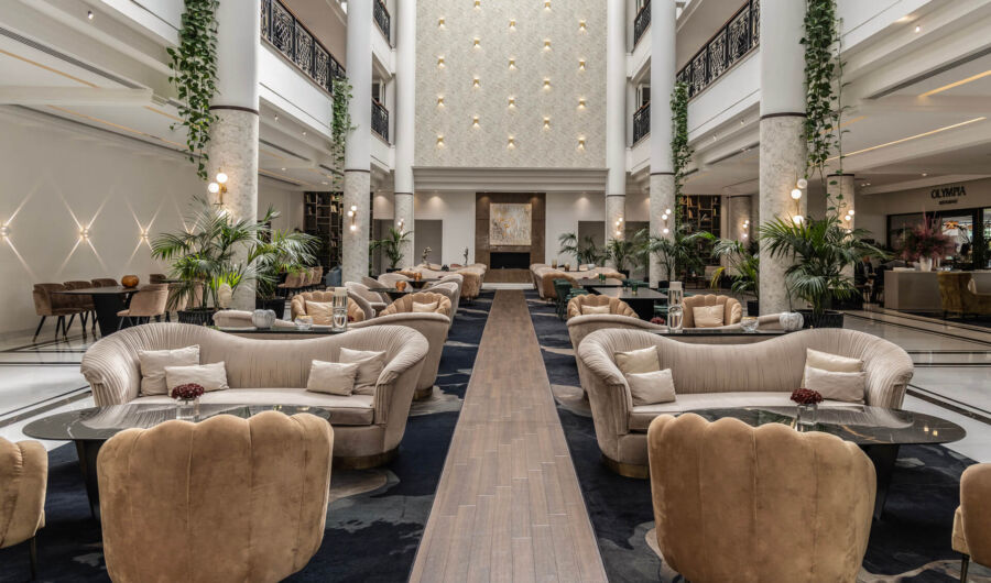 Hilton Nicosia Reception area with tables and couches