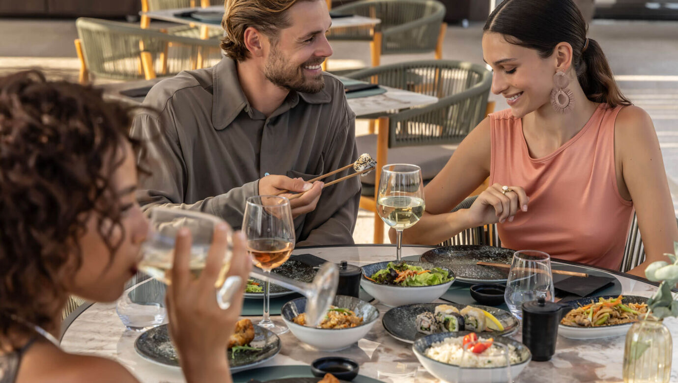 Guests enjoying Japanese dining experience at Fiki restaurant in Paphos