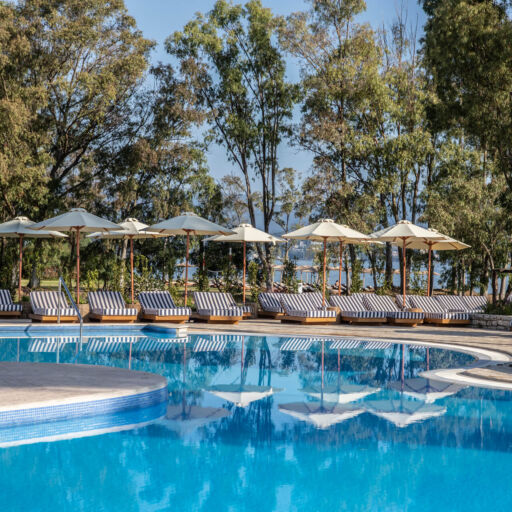 Kerkyra blue pool with sunbeds
