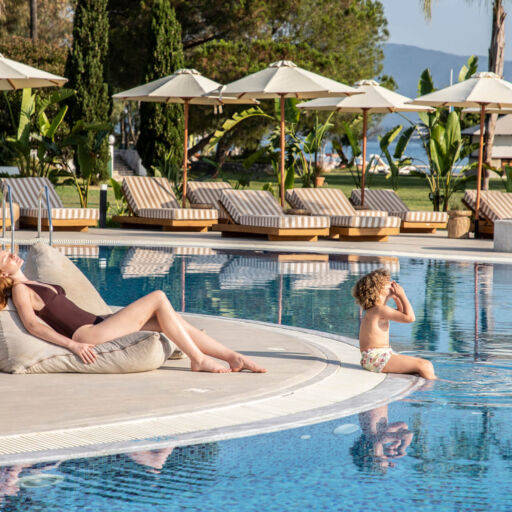 Mother and child near the pool at Kerkyra Blue Hotel
