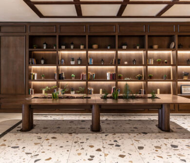 Table and bookshelf at Kerkyra Blue Naida restaurant
