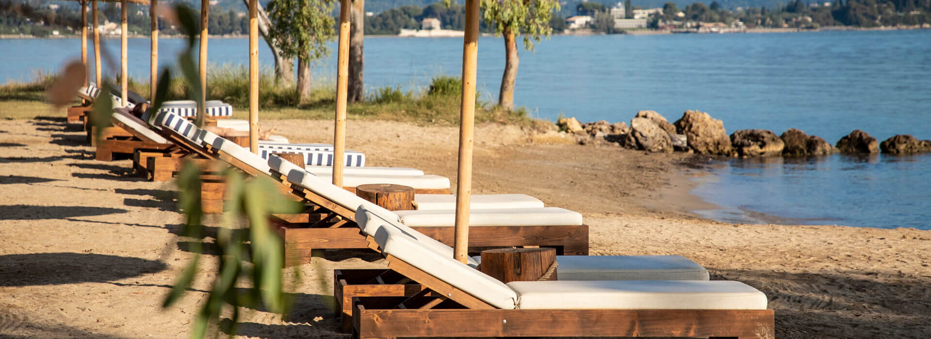 Sunbeds at beach Kerkyra Blue
