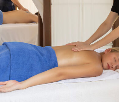 Woman getting a massage outdoors at Kerkyra Blue spa
