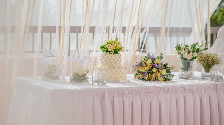 Wedding cake and decorations on table at Kerkyra Blue