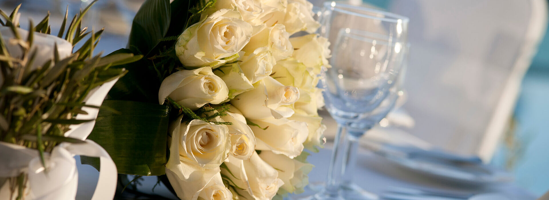 Wedding flowers and decorations on table at Kerkyra blue