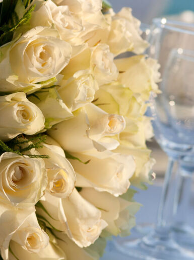 Wedding flowers and decorations on table at Kerkyra blue