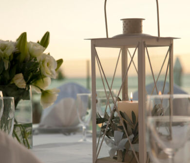 Table with wine and wedding decorations at Kerkyra Blue