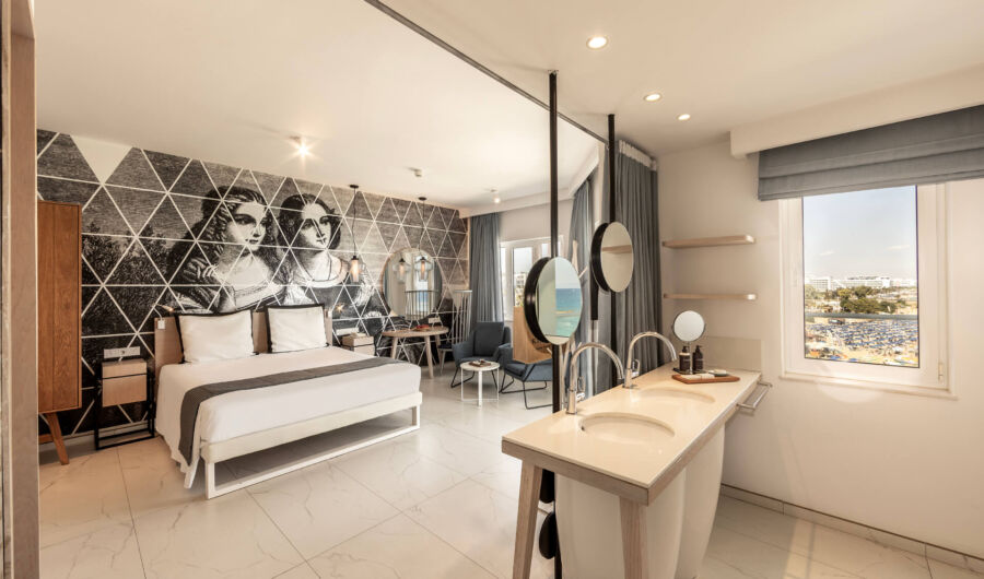 King Jason Protaras bedroom and sinks with view of other resorts