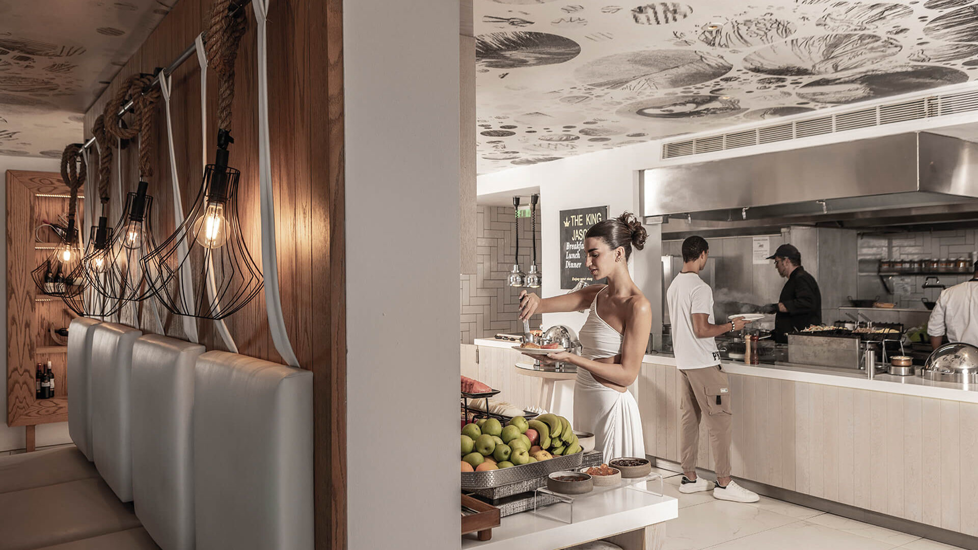 People getting food from buffet at King Jason Protaras