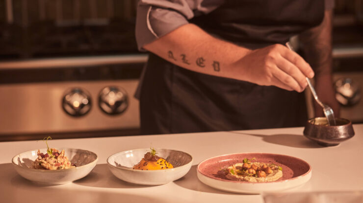 Chef preparing dishes at King Jason Zante