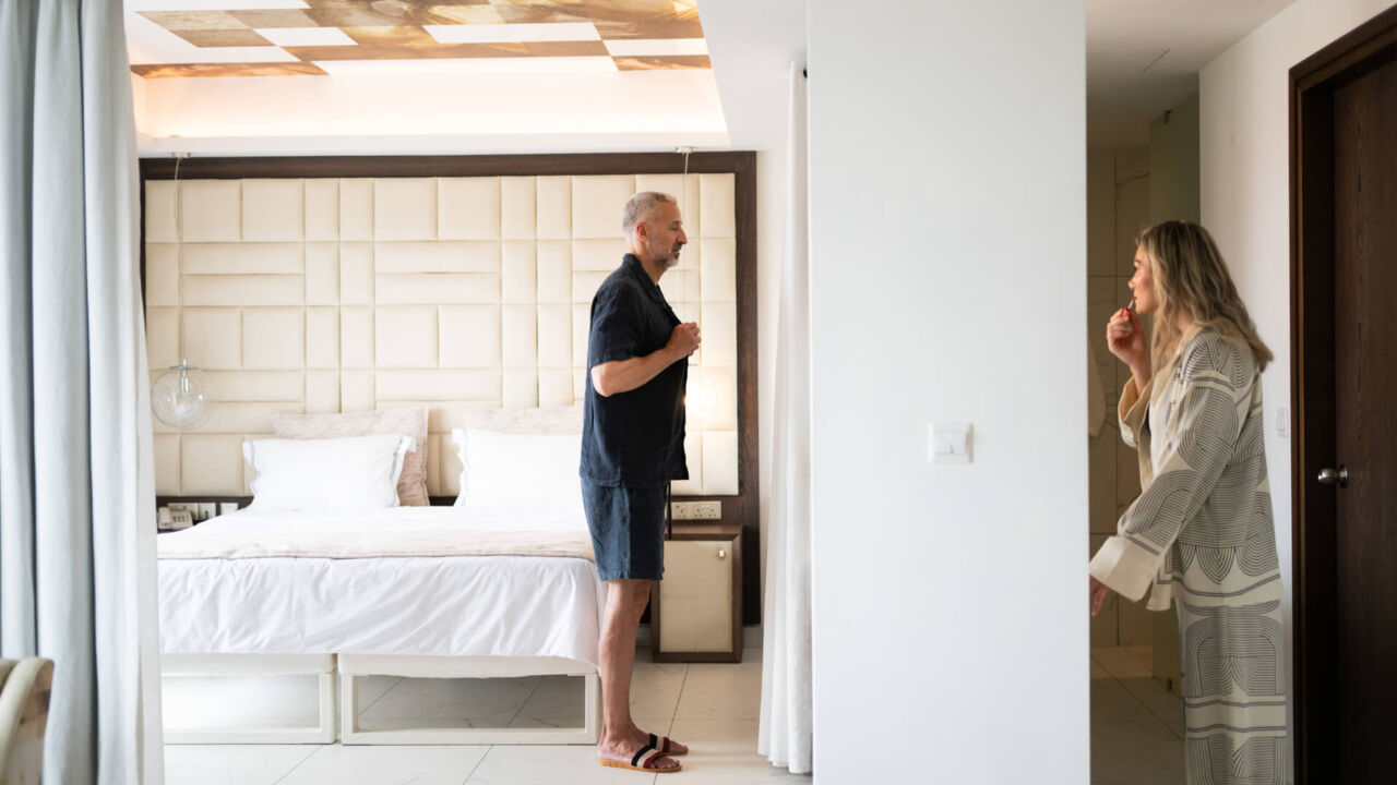 Couple Preparing at King Jason Paphos Room