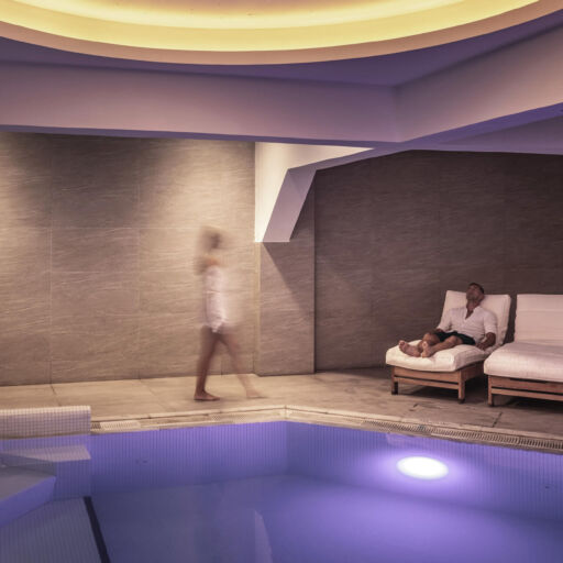 Indoor pool wat spa with sunbeds at King Jason Paphos