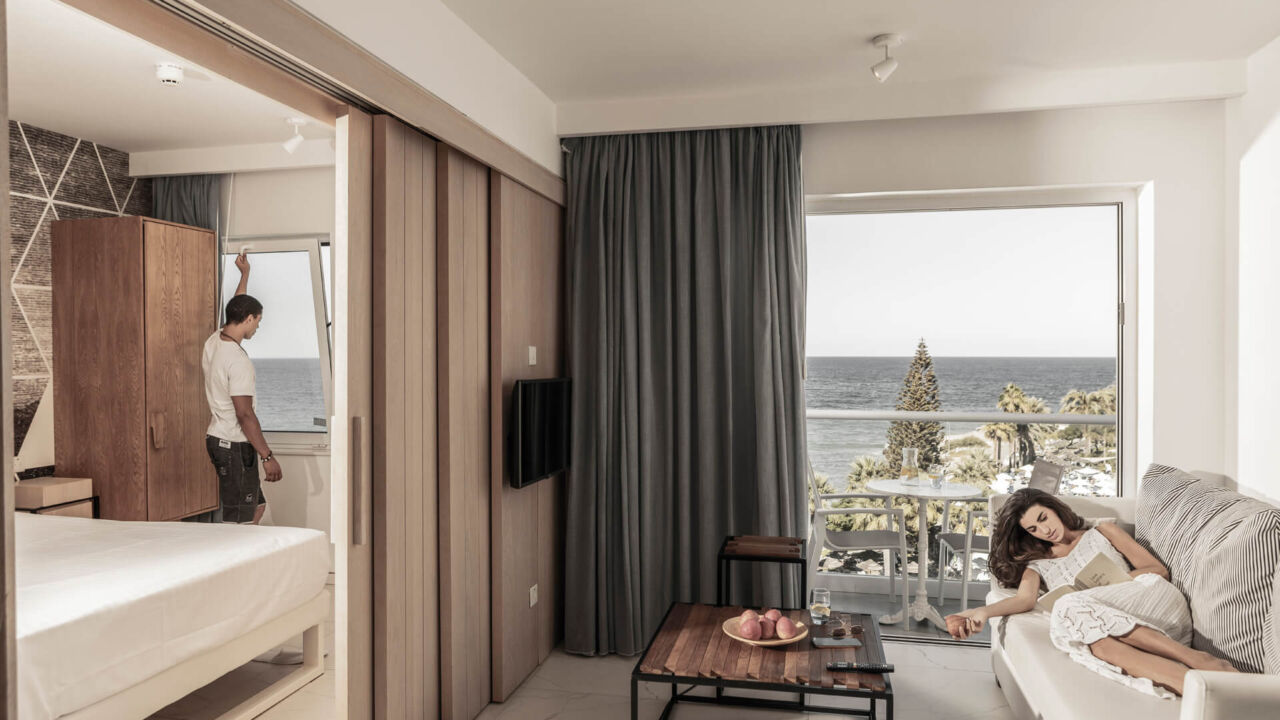 Couple relaxing at King Protaras room