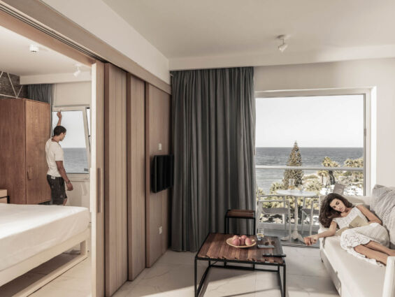 Couple relaxing at King Protaras room
