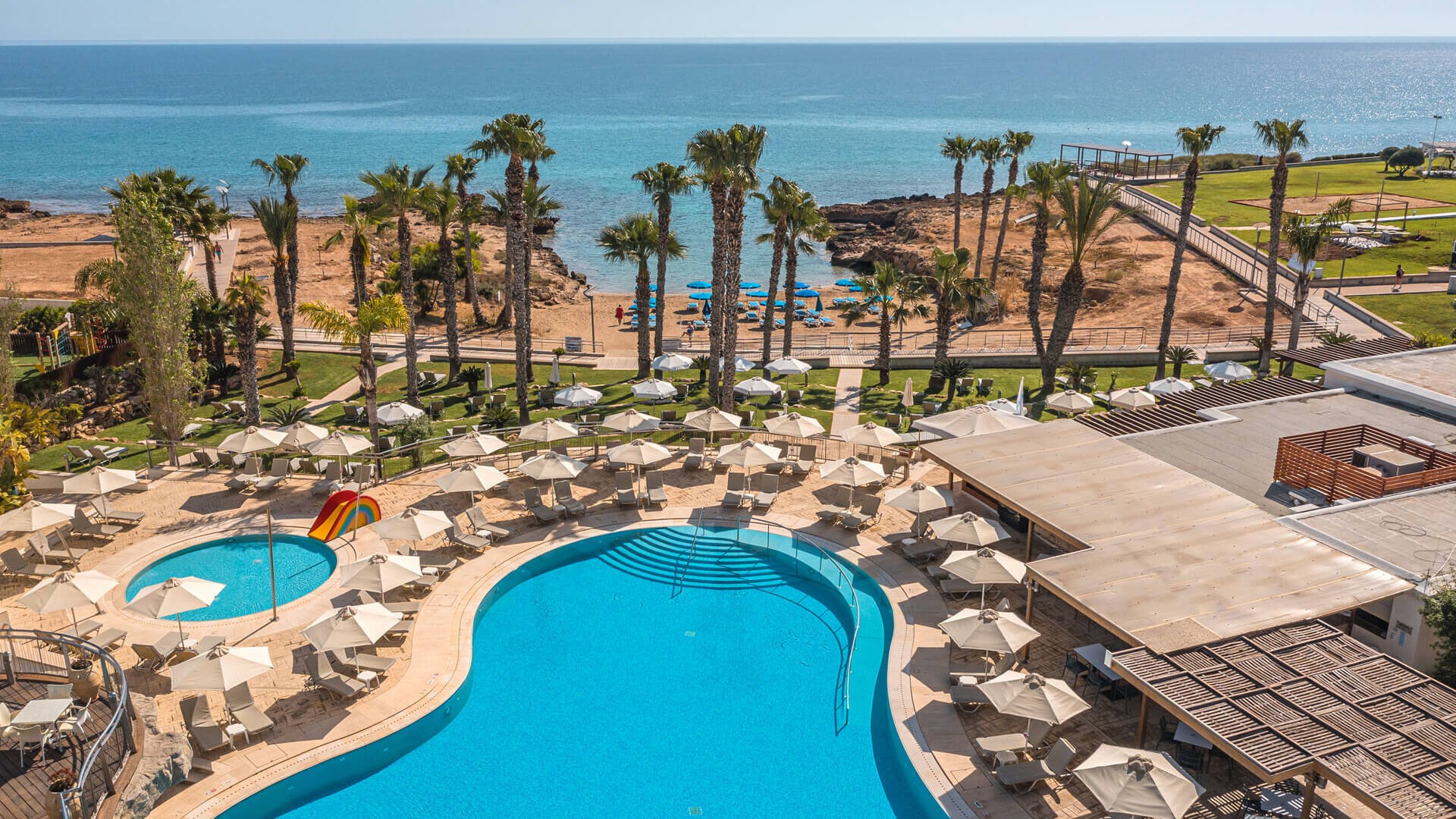 Louis Althea Hotel facilities pool , garden and beach