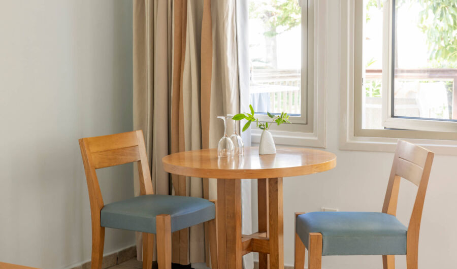 Louis Althea Beach Studio side table with chairs