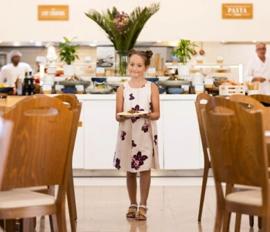 Child getting pasta at Louis Althea Lydia buffet