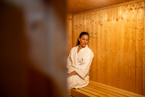 Woman in sauna at Louis Althea Spa