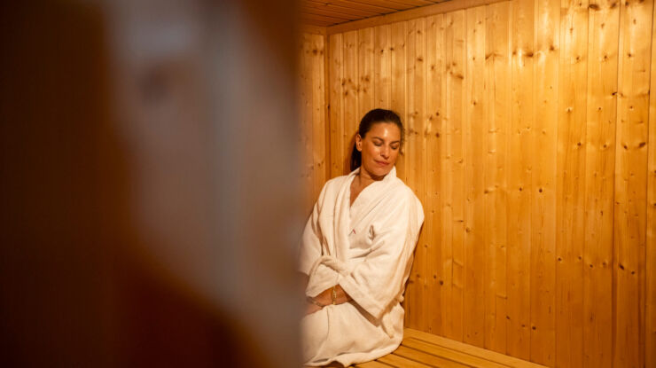 Woman in sauna at Louis Althea Spa