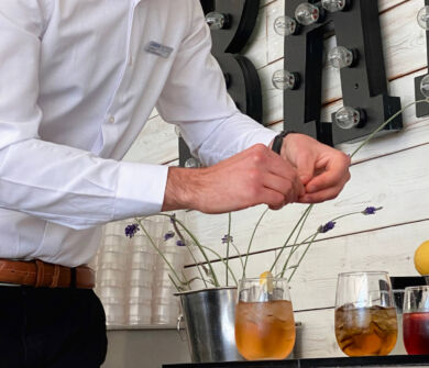 Waiter preparing cocktails at Louis Ledra Sundowner bar