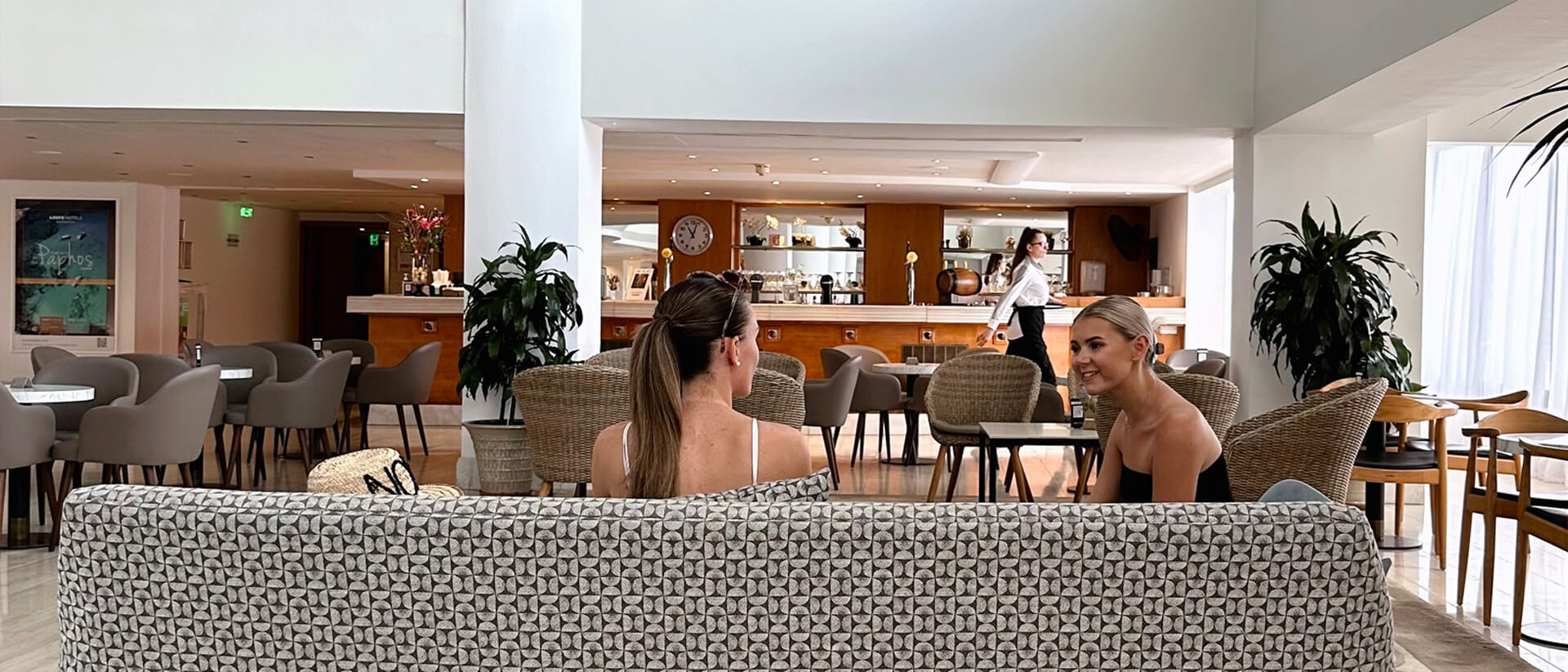 two women sitting at a couch at Louis Ledra Gazebo Restaurant
