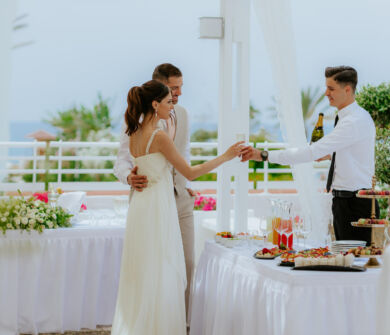 Couple getting wine at Louis Ledra Beach