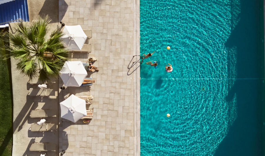 Louis Nausicaa Beach pool and sunbed with people swimming