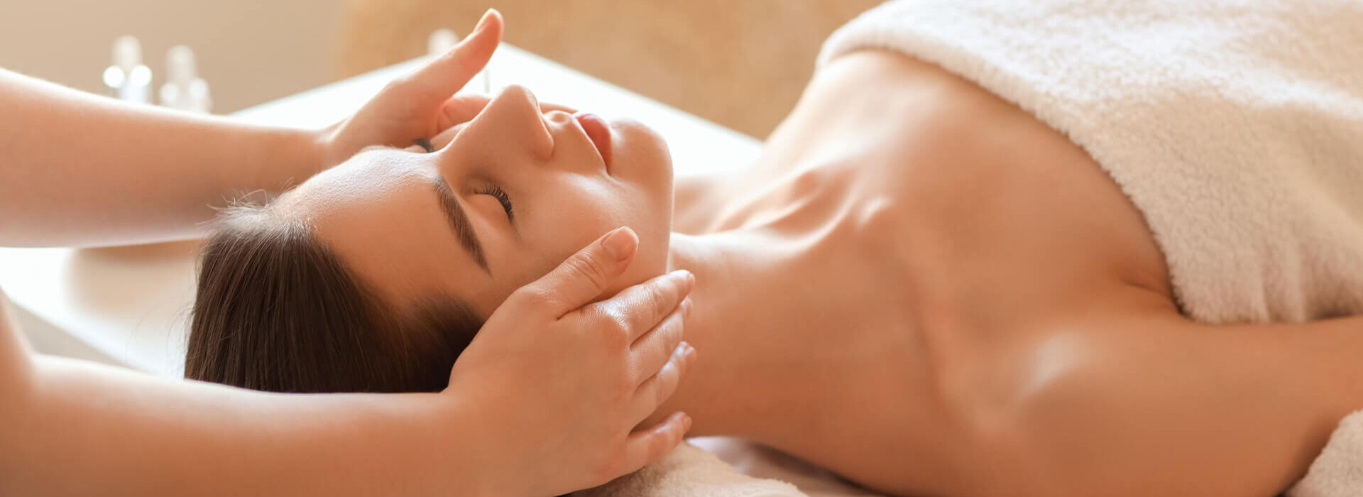 Woman getting head massage at Louis Nausicaa spa